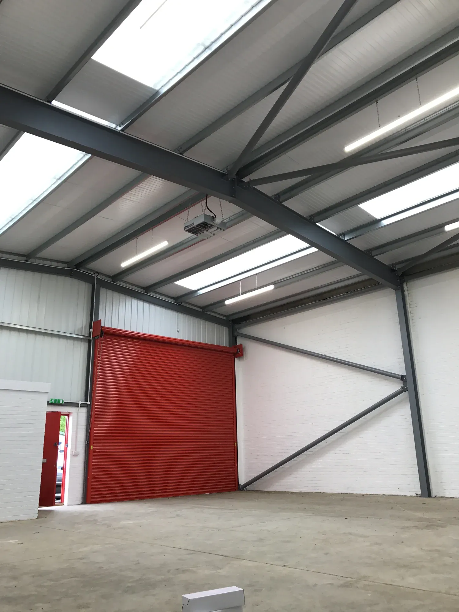 Lighting and power installed throughout an industrial unit in Wellingborough