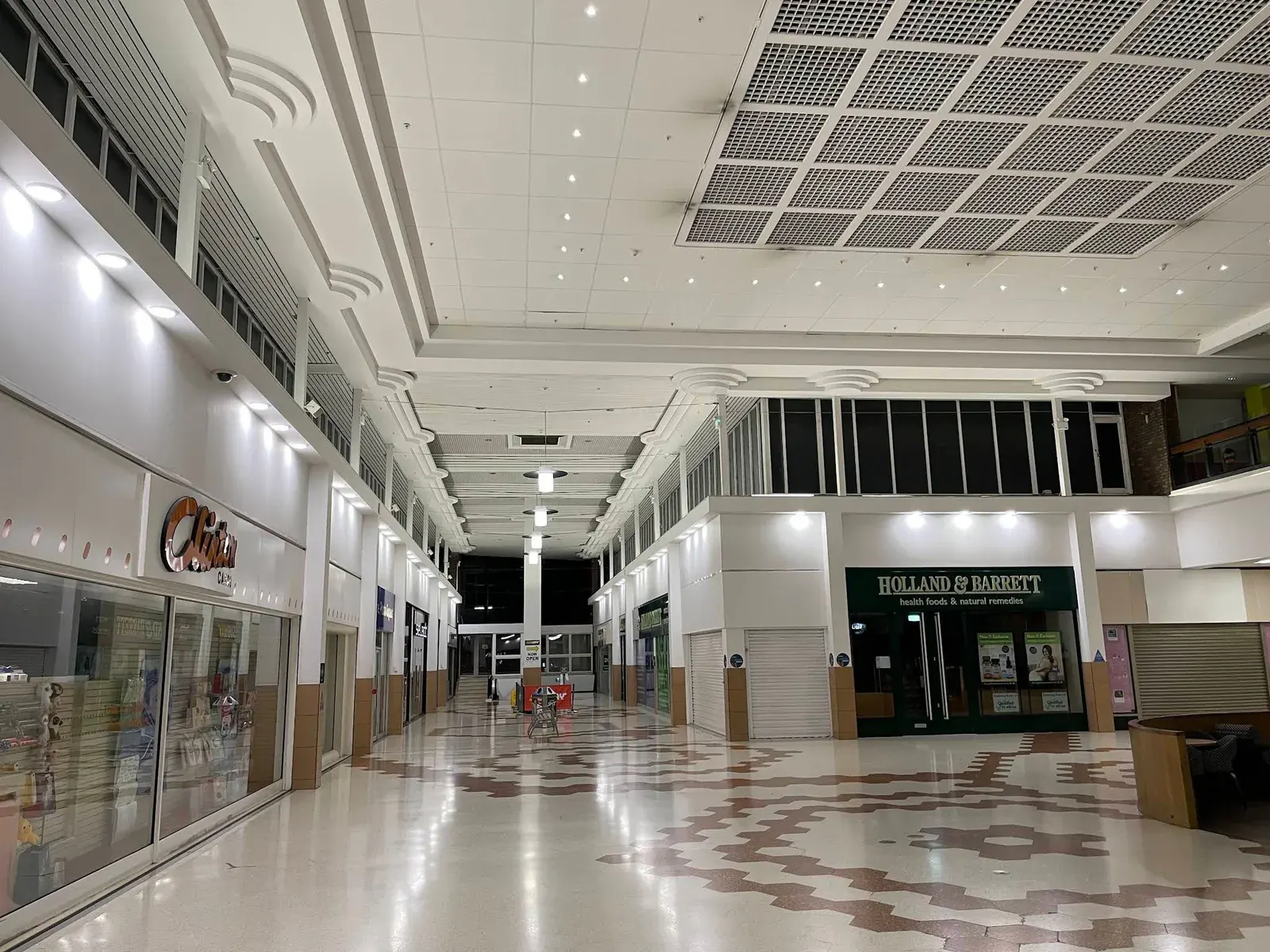 Emergency and escape route lighting installed in a retail arcade in Northamptonshire