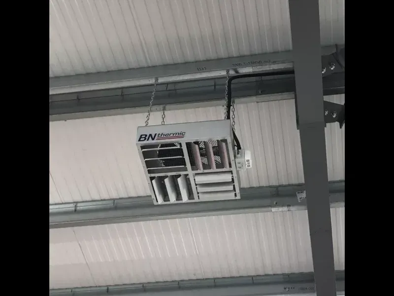 Ventilation unit installed and wired at high level in a Northamptonshire building